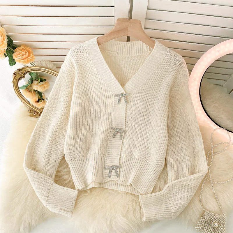 Lovely bow-knot long-sleeved cardigan sweater  137